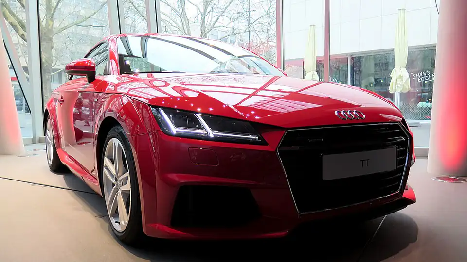 2014 Audi TT Coupé 2.0 TFSI quattro S tronic 169 kW Tangorot Vorderansicht