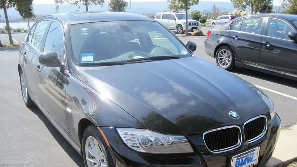 2010 black BMW 328i (E90)