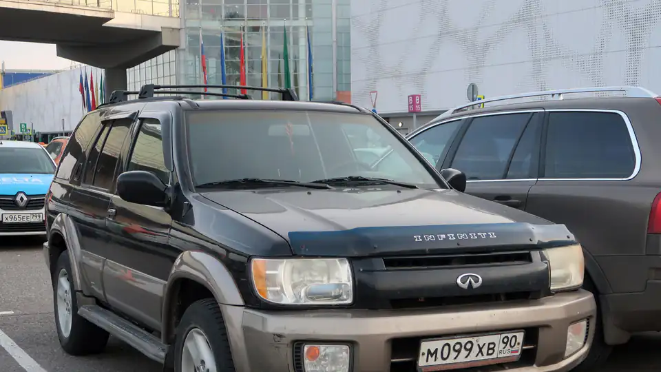 2002 Infiniti QX4 Black Obsidian and Bronze